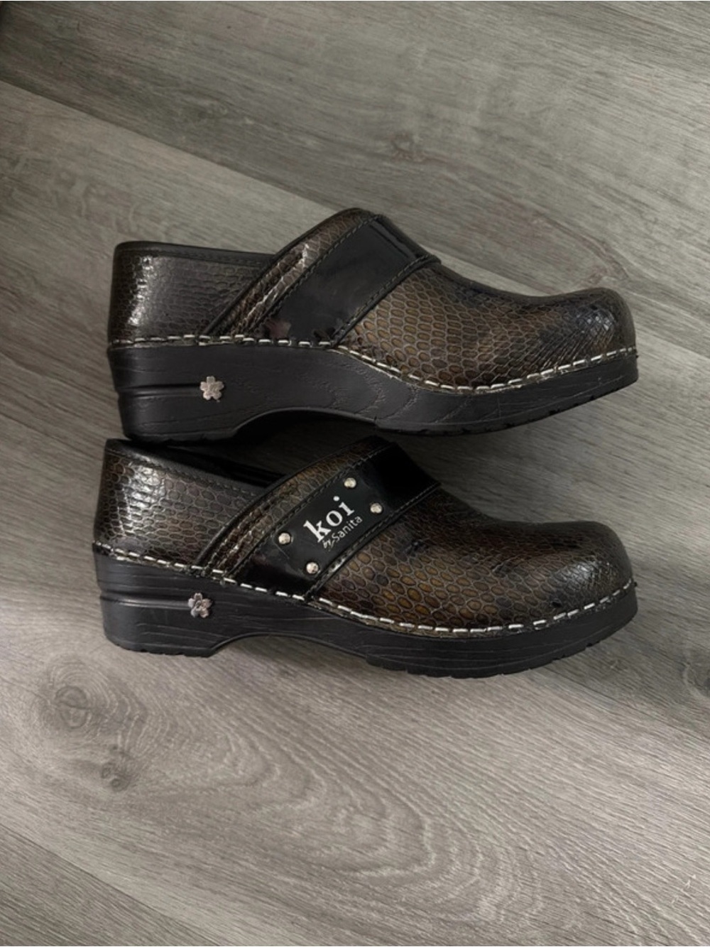 Sanita Dark Brown Snake-Print Clogs